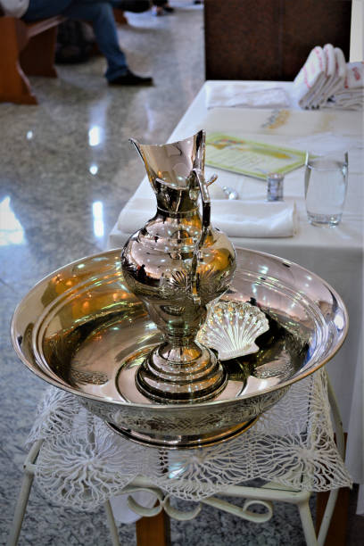 A beautiful jar crafted with bowl for baptism on the table