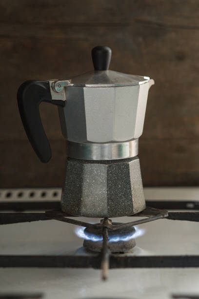 istock Turk coffee maker stands on a gas stove. Visible fire 1394245422