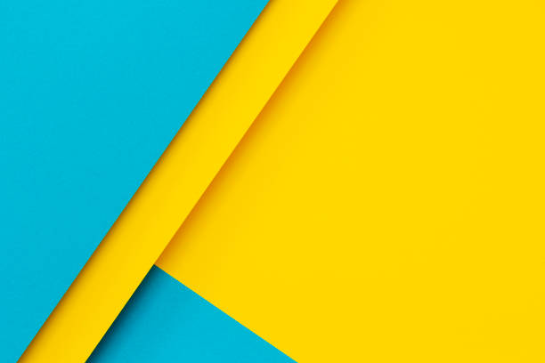istock Abstract color papers geometry flat lay composition background with blue and yellow tones 1394247446