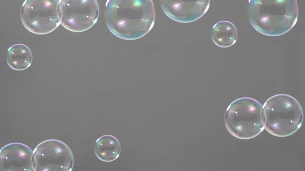 istock Soap bubble drop or Shampoo bubbles floating like flying in the air black background which represent refreshing moments and gentle soft. Bubbles drops for soap  shampoo or detergent product industry. 1394249948