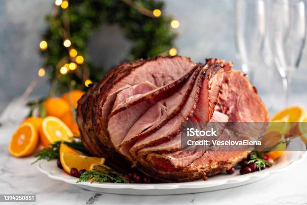 Spiral Sliced Christmas Ham With Orange Honey Glaze Stock Photo - Download Image Now
