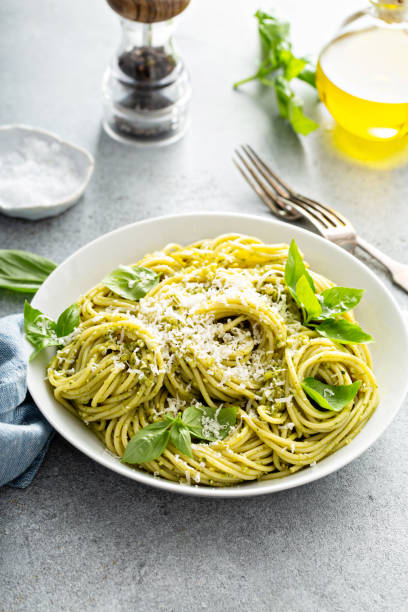 istock Basil pesto pasta with parmesan and olive oil 1394250878