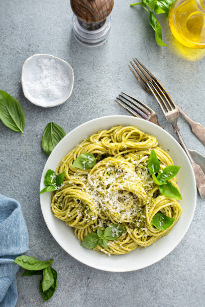 istock Basil pesto pasta with parmesan and olive oil 1394250894