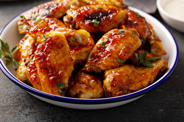 istock Hot sauce glazed chicken wings, roasted or fried 1394250928