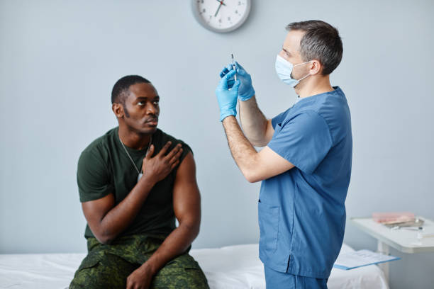 istock Soldier Getting Vaccine In Hospital 1394260816