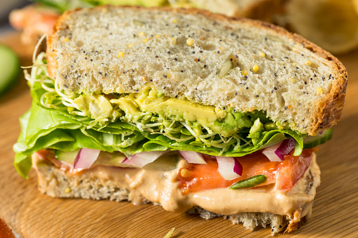 Homemade Mediterranean Veggie Hummus Sandwich with Tomato and Cucumber