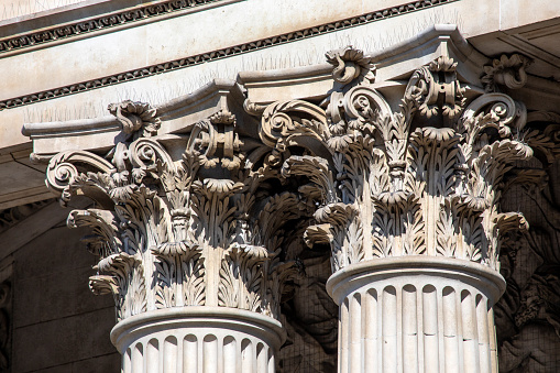Close-up shot of the intricate detail of the exterior columns of St. Pauls Cathedral in the city of London, UK.