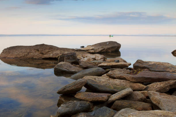 istock A path of stones going into the water 1394265190