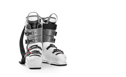 Professional ski boots isolated on white background