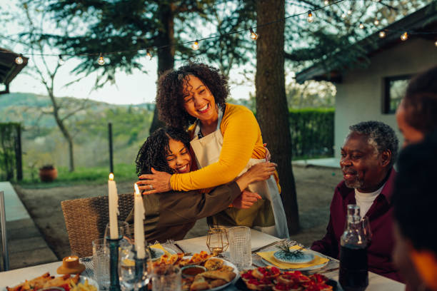 istock African american multi-generation family gathering for reunion. 1394270066
