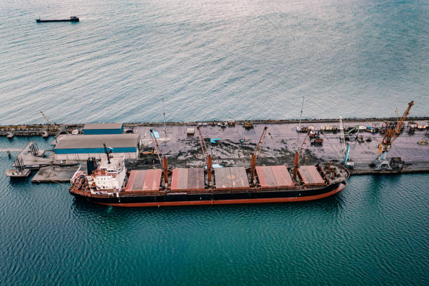 istock Drone Point View of Cargo Ship in the Port. 1394272510