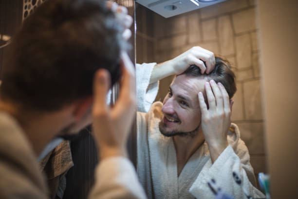 istock Middle aged man in the bathroom 1394278093