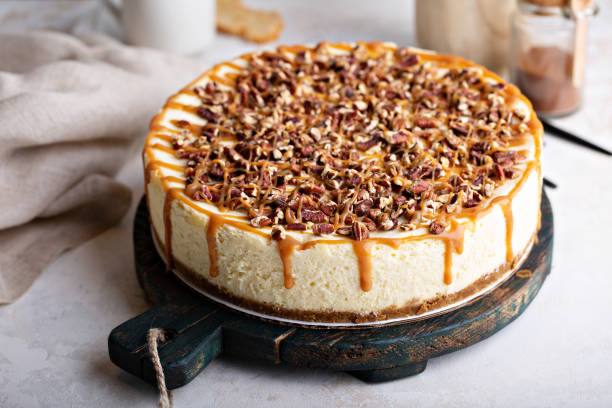istock Caramel pecan cheesecake topped with chopped nuts 1394281306