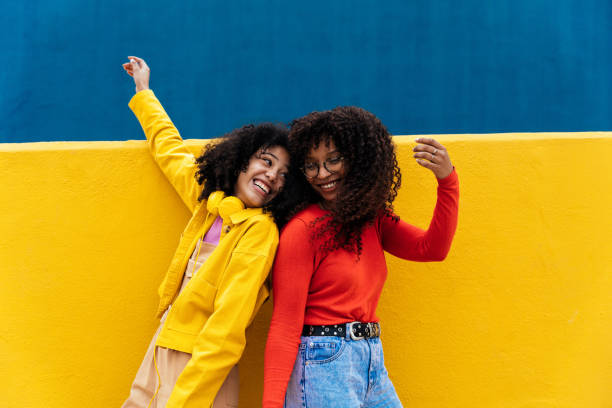 istock Young happy women dancing and having fun outdoor 1394282041
