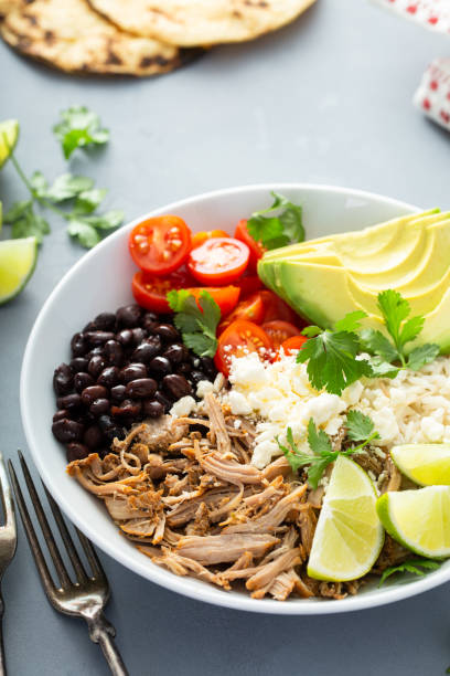 istock Pork carnitas bowl or burrito bowl with rice 1394283247