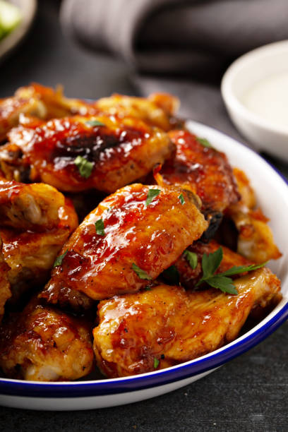 istock Hot sauce glazed chicken wings, roasted or fried 1394283290