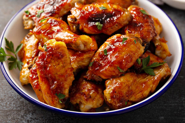 istock Hot sauce glazed chicken wings, roasted or fried 1394283299