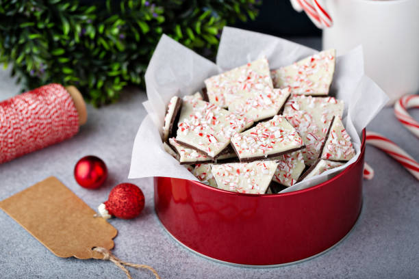 istock Homemade peppermint bark, white and dark chocolate with crushed candy canes 1394283310