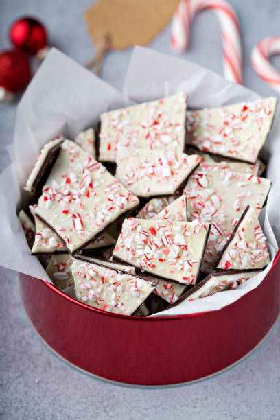 istock Homemade peppermint bark, white and dark chocolate with crushed candy canes 1394283314