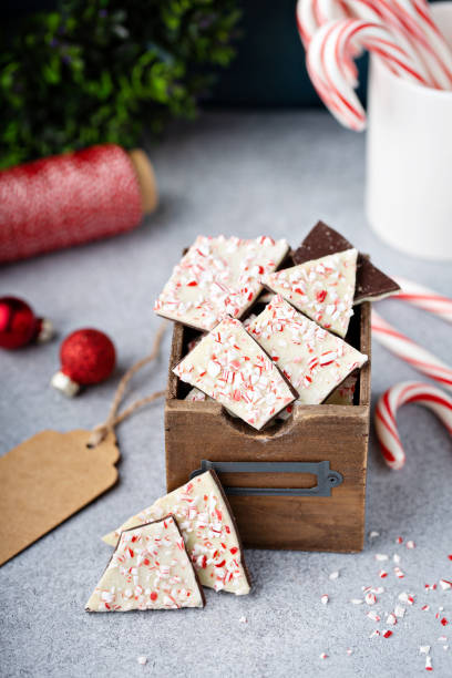istock Homemade peppermint bark, white and dark chocolate with crushed candy canes 1394283317