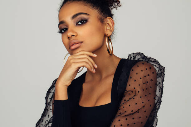 istock Beautiful afro woman with perfect make-up 1394283387