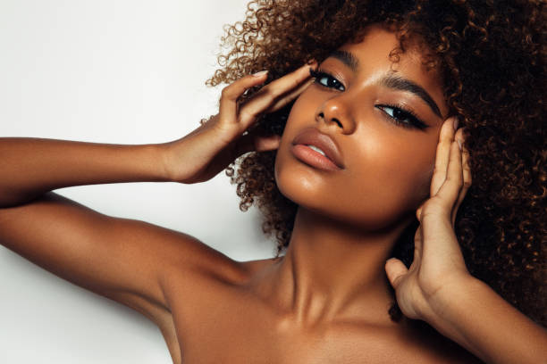 istock Beautiful afro girl with curly hairstyle 1394284146