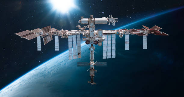 International space station in outer space. ISS on orbit of Earth planet. Space sci-fi collage with satellite and spaceship. Astronauts on orbit. Elements of this image furnished by NASA International space station in outer space. ISS on orbit of Earth planet. Space sci-fi collage with satellite and spaceship. Astronauts on orbit. Elements of this image furnished by NASA (url:https://www.nasa.gov/sites/default/files/styles/full_width_feature/public/thumbnails/image/iss063e074377.jpg https://www.nasa.gov/sites/default/files/styles/full_width_feature/public/thumbnails/image/iss066e080432.jpg) international space station stock pictures, royalty-free photos & images