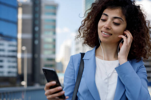 istock Young happy businesswoman communting to work 1394289045
