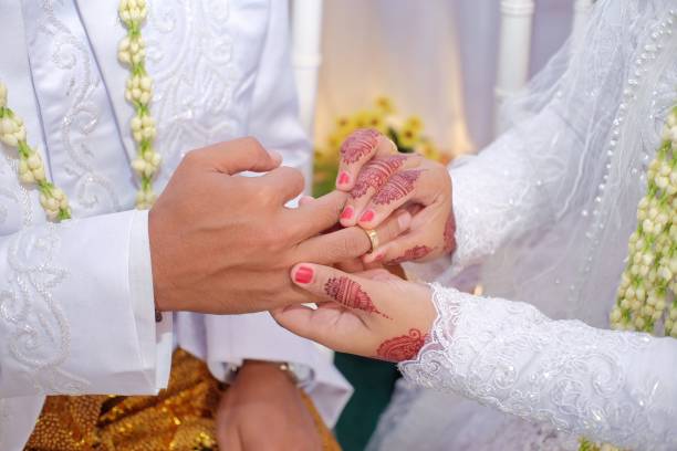 istock A pair of brides exchange rings after they both pledged 1394289924