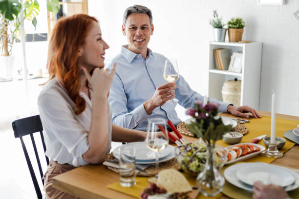 istock Side view of a married couple during lunch 1394290947