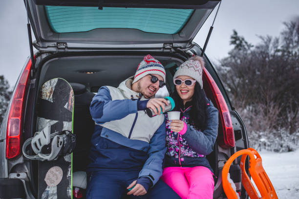 istock Couple walking hugged and enjoying the snow 1394290989