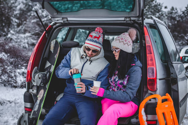 istock Couple walking hugged and enjoying the snow 1394290992