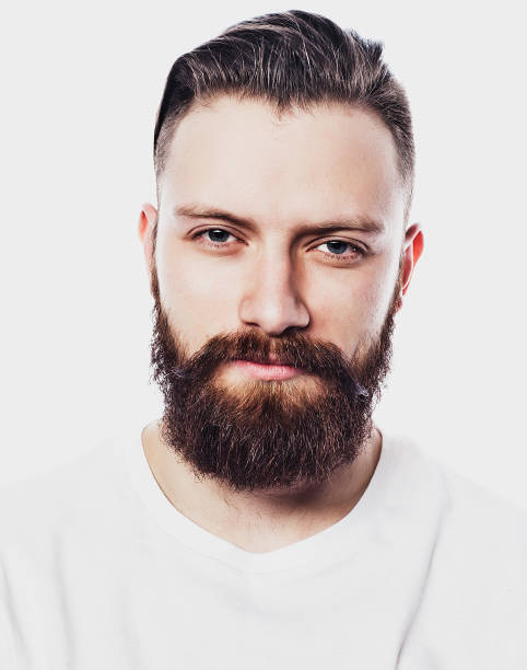 istock Young bearded man over white background. Lifestyle and people concept 1394292878
