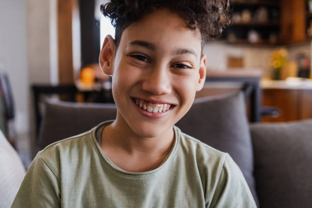 istock Close up of a cute boy at home 1394295829