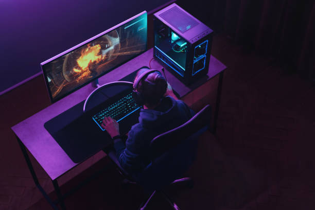 top view of man pro gamer playing online video game at home - gamer imagens e fotografias de stock