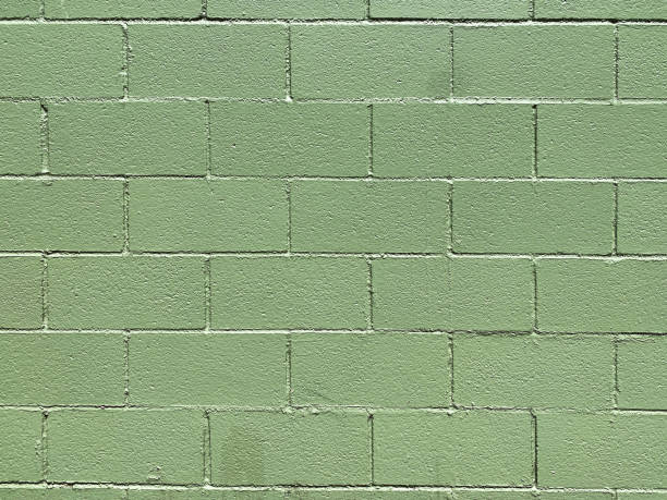 istock green paint brick stone wall interior design painted cement building concrete facade 1394299792