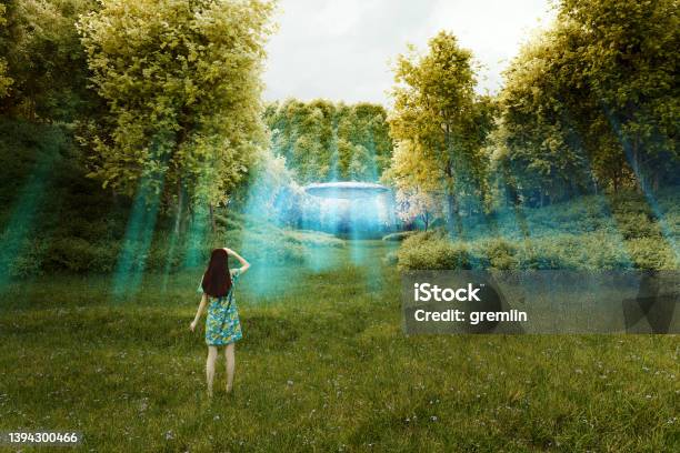 Young Woman In Forest With Landing Ufo Stock Photo - Download Image Now - Nature, Awe, Digitally Generated Image