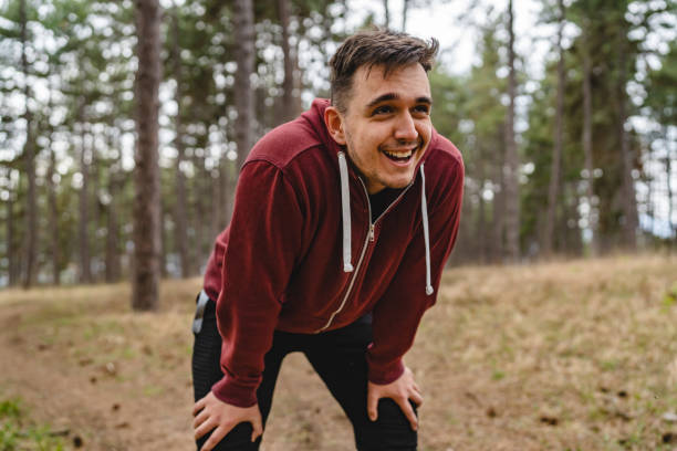 istock One man taking a brake during training in nature tired caucasian male taking breath while making a pause while train in forest or public park alone real people copy space 1394303752