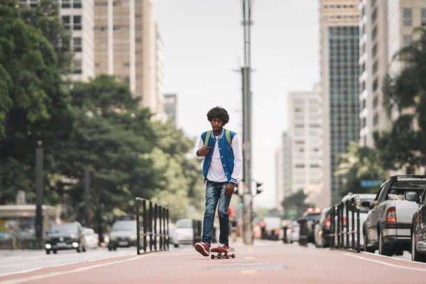 istock Man skateboarding in the city 1394307418