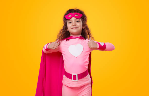 istock Happy superhero kid showing thumbs up 1394308011
