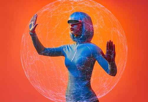Slim futuristic female in wig and augmented reality goggles interacting with digital plexus sphere against orange background