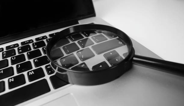 istock Concept For Searching On Internet, Magnifier On Computer Keyboard 1394317205