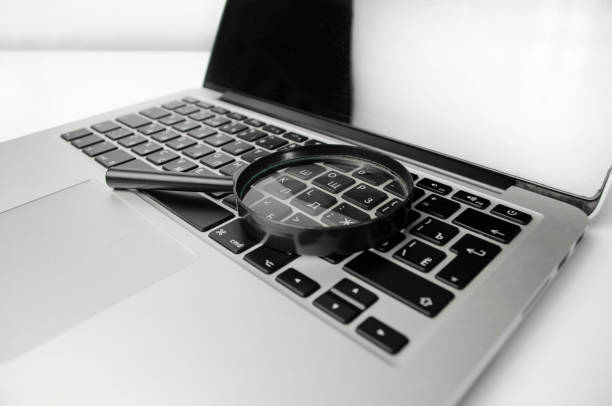 istock Concept For Searching On Internet, Magnifier On Computer Keyboard 1394317207