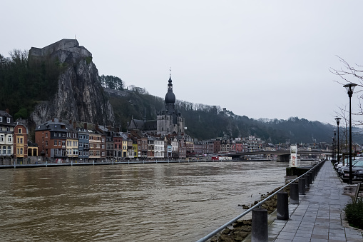 Dinant, Belgium – January 2018 – Urban landscape of Dinant, a city and municipality of Wallonia located in the province of Namur on the shores of river Meuse on a cold and gray winter day