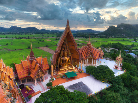 Aerial landscape view of Wat Tham Sua on a hilltop just outside of Kanchanaburi, Thailand.