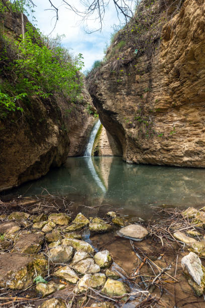 istock Small beautiful waterfall in the mountains 1394340367