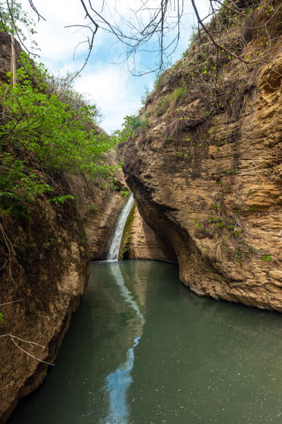 istock Small beautiful waterfall in the mountains 1394340432