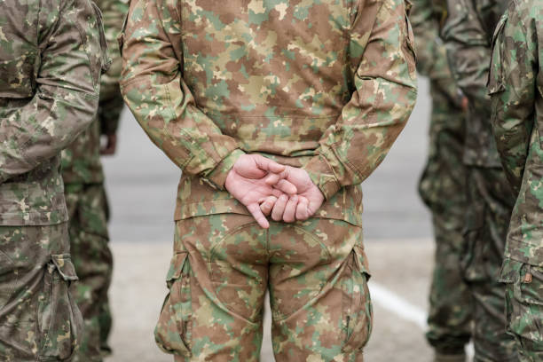 Romanian land forces soldiers take part at a public ceremony during the Romanian Land Forces National day. Bucharest, Romania - April 28, 2022: Romanian land forces soldiers take part at a public ceremony during the Romanian Land Forces National day. nato stock pictures, royalty-free photos & images