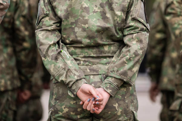 Romanian female land forces soldier take part at during the Romanian Land Forces National day. Bucharest, Romania - April 28, 2022: Romanian female land forces soldier take part at during the Romanian Land Forces National day. nato stock pictures, royalty-free photos & images