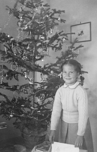 Little Girl and Christmas Tree in 1955.